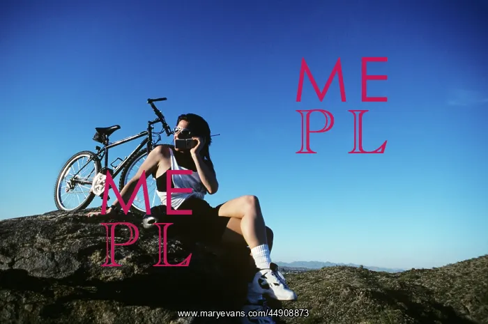 : Mountain Biker Using Cellular Telephone : Mountain Biker Using Cellular Telephone