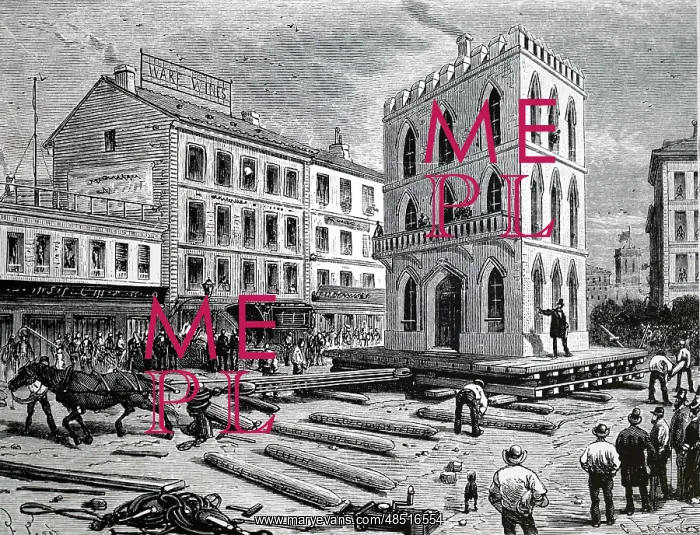 : Moving a house across Chicago, using rollers : Moving a house across Chicago, using rollers