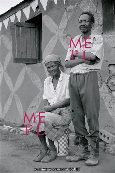 : Mr and Mrs Modikwane Molefe outside their home on a : Mr and Mrs Modikwane Molefe outside their home on a