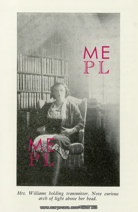 : Mrs. William holding transmitter : Mrs. William holding transmitter