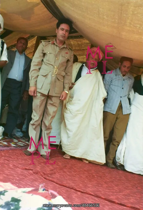 : Muammar Gaddafi and Men praying - Sousa, Libya : Muammar Gaddafi and Men praying - Sousa, Libya