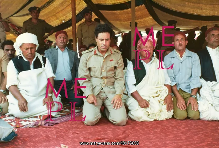 : Muammar Gaddafi and Men praying - Sousa, Libya : Muammar Gaddafi and Men praying - Sousa, Libya