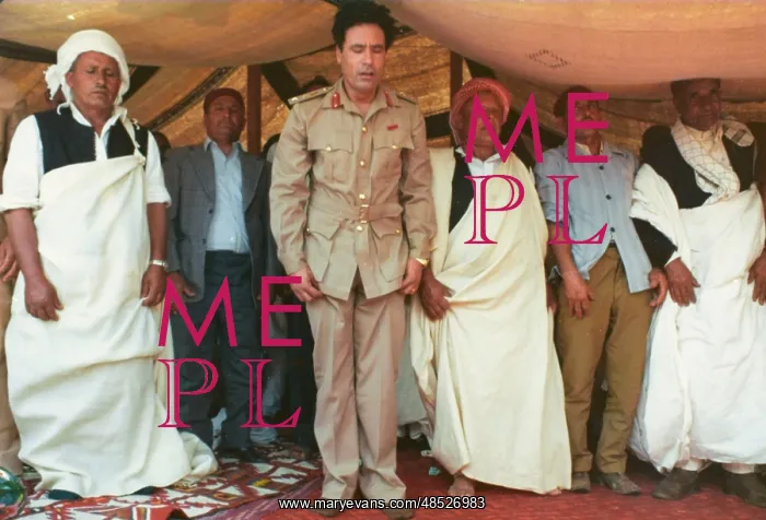: Muammar Gaddafi and Men praying - Sousa, Libya : Muammar Gaddafi and Men praying - Sousa, Libya