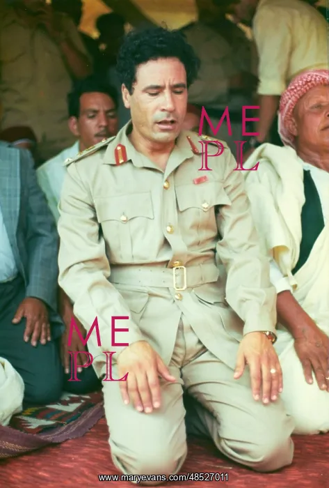 : Muammar Gaddafi and Men praying - Sousa, Libya : Muammar Gaddafi and Men praying - Sousa, Libya