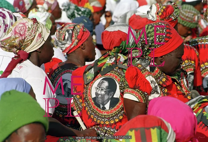 : Mugabe's image on supporters dresses : Mugabe's image on supporters dresses