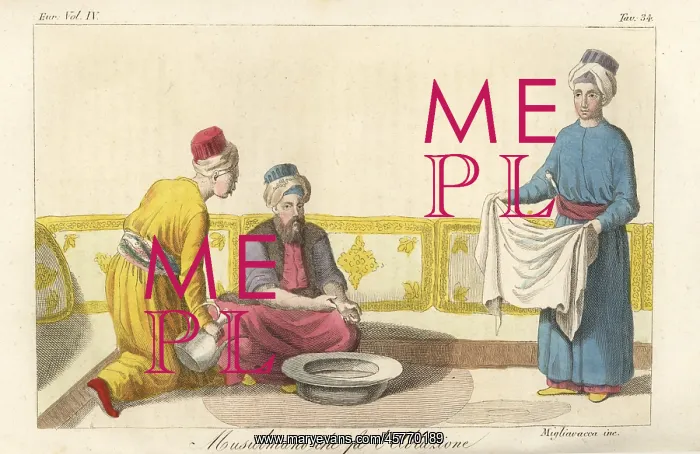 : A Muslim man performing his ablutions before prayer : A Muslim man performing his ablutions before prayer