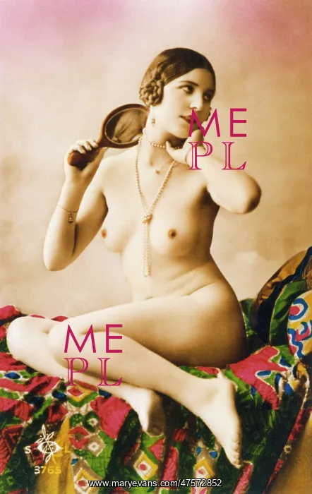  : Naked model posing in a sexy glamour pose with a mirror