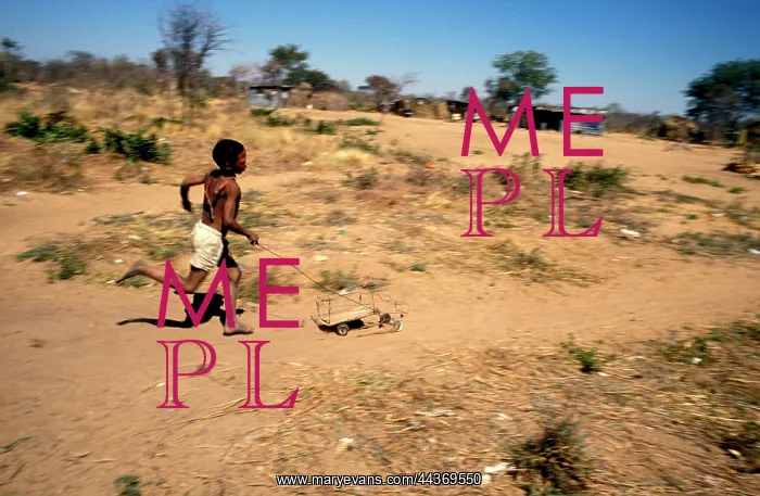 : Namibia, Bushman Land, 1997: A San's child playing : Namibia, Bushman Land, 1997: A San's child playing