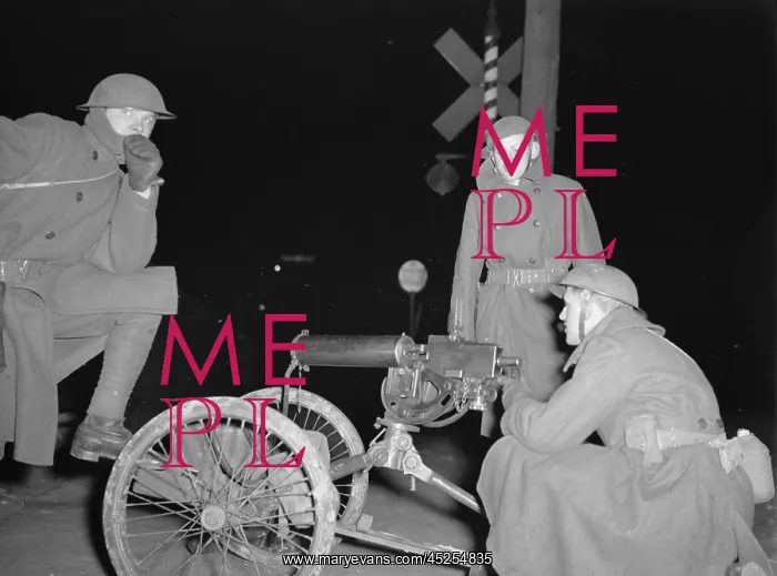 : National Guard with machine gun overlooking GM : National Guard with machine gun overlooking GM