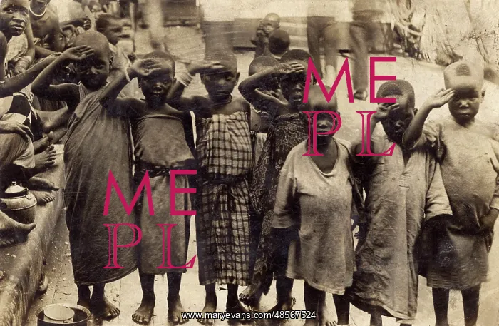  : Native African children saluting