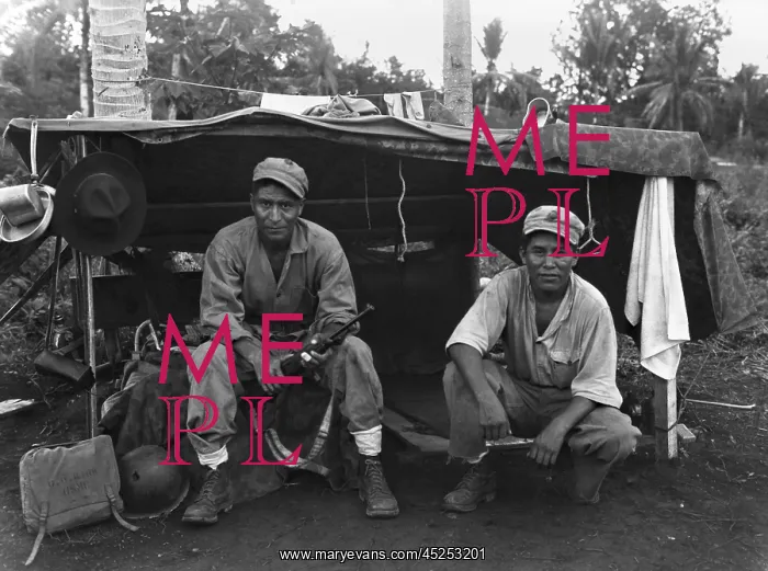 : Native American Marines at their shelter on a : Native American Marines at their shelter on a