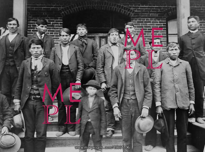 : Native American young men and a boy posed on the : Native American young men and a boy posed on the