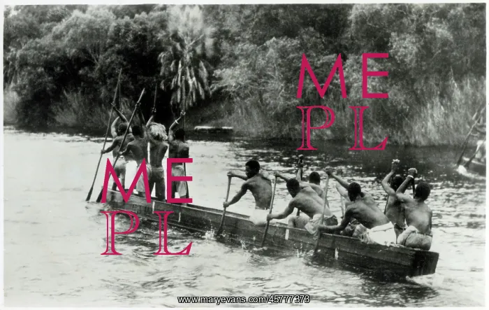 : A native canoe on the Zambezi River : A native canoe on the Zambezi River