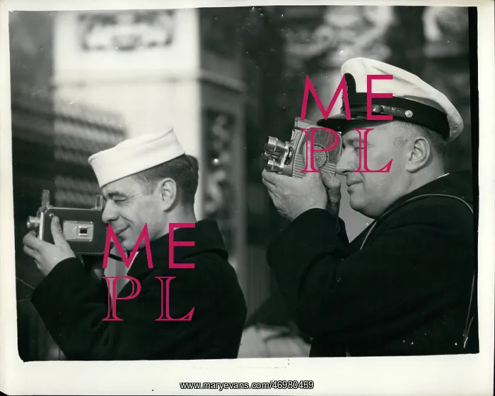 : US naval officers taking photographs : US naval officers taking photographs
