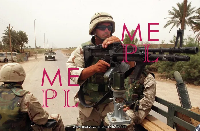 : A US Navy serviceman maintains security for his : A US Navy serviceman maintains security for his