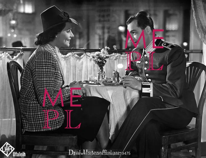 : NCO with lady in a cafe, 1938 : NCO with lady in a cafe, 1938