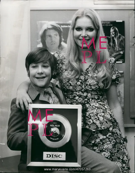 : Neil Reid, schoolboy singer, with silver disc : Neil Reid, schoolboy singer, with silver disc