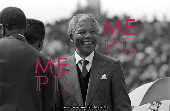 : Nelson Mandela smiling at his first rally after his release : Nelson Mandela smiling at his first rally after his release
