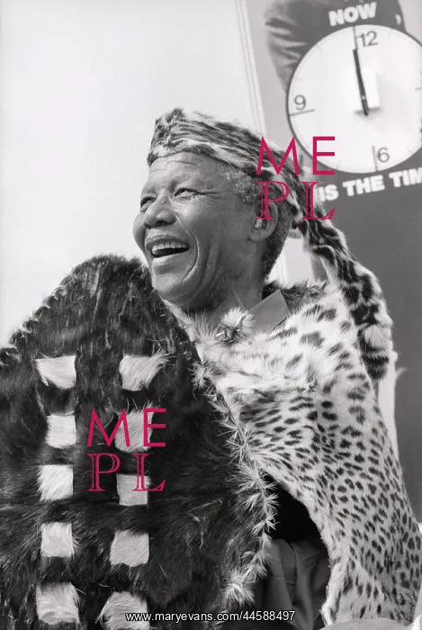 : Nelson Mandela, in traditional clothing with shield : Nelson Mandela, in traditional clothing with shield