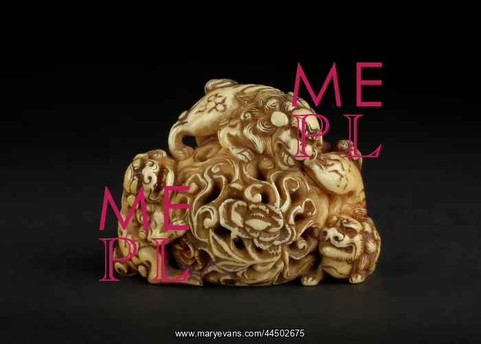 : Netsuke in the form of three shishi playing on a rock : Netsuke in the form of three shishi playing on a rock