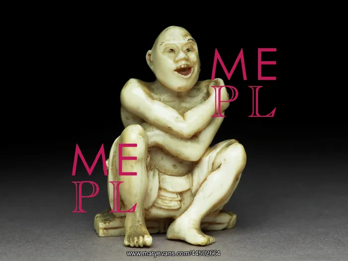: Netsuke - man sitting on a mat made of twigs washing himself : Netsuke - man sitting on a mat made of twigs washing himself