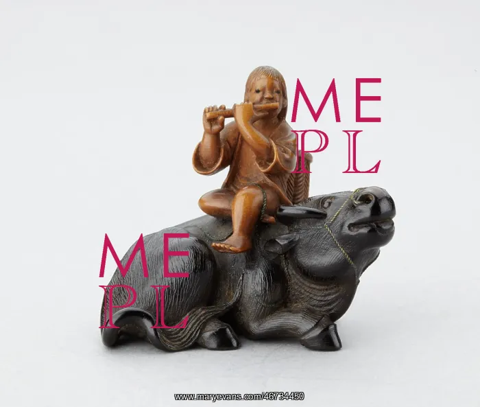 : Netsuke of a oshikyo sitting on an ox playing the flute : Netsuke of a oshikyo sitting on an ox playing the flute