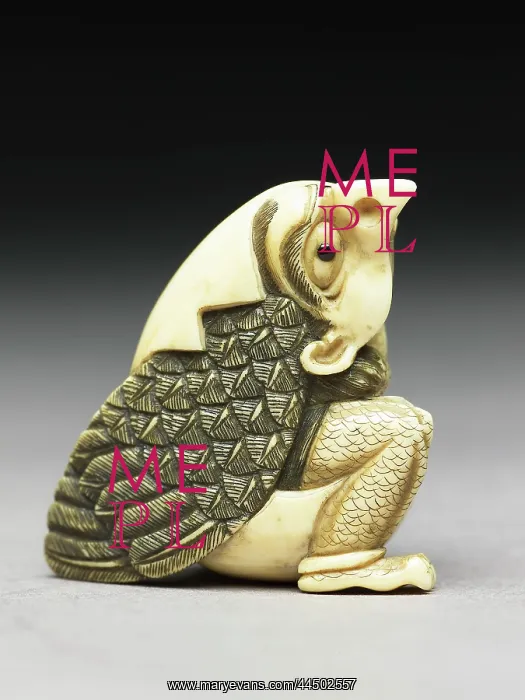 : Netsuke of a tengu mountain demon emerging from an egg : Netsuke of a tengu mountain demon emerging from an egg