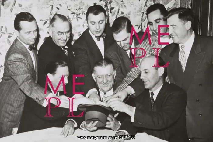 : NFL owners gather around Commissioner Bert Bell : NFL owners gather around Commissioner Bert Bell