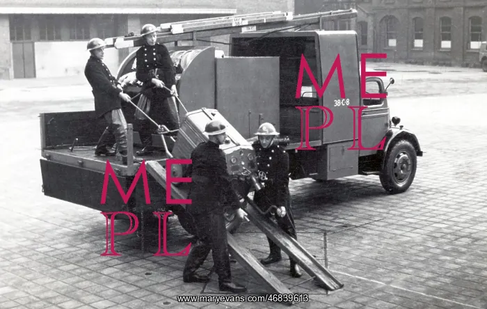 : NFS heavy unit crew removing mobile pump by ramp : NFS heavy unit crew removing mobile pump by ramp