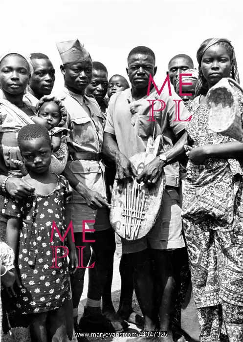 : A Ngbandi man playing the Ngombi bamboo noted mbira : A Ngbandi man playing the Ngombi bamboo noted mbira