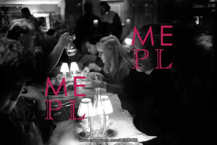 : A night out. Patrons sitting at a table in a restaurant : A night out. Patrons sitting at a table in a restaurant