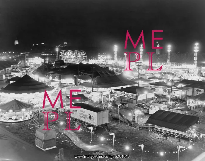 : Night view of the tents and rides at the ? : Night view of the tents and rides at the ?