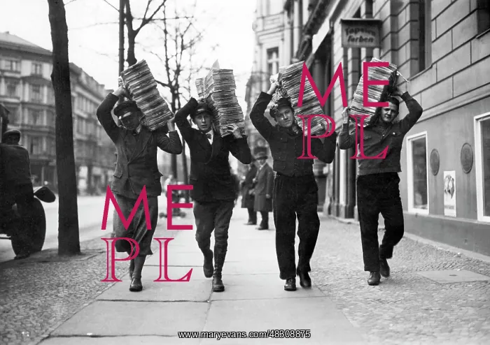 : NSDAP members carrying a propaganda stack, 1932 : NSDAP members carrying a propaganda stack, 1932