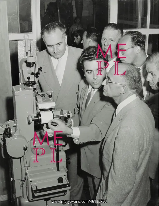 : The nuclear physicist Enrico Fermi (right) in Milan at t : The nuclear physicist Enrico Fermi (right) in Milan at t