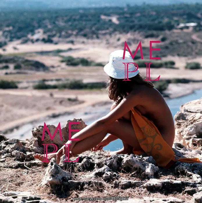  : Nude woman looking at the view in Spain