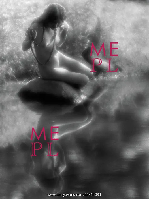 : Nude woman wearing long string of beads looking : Nude woman wearing long string of beads looking