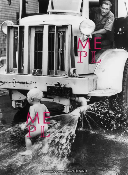 : A nudie beneath the sprinkler : A nudie beneath the sprinkler