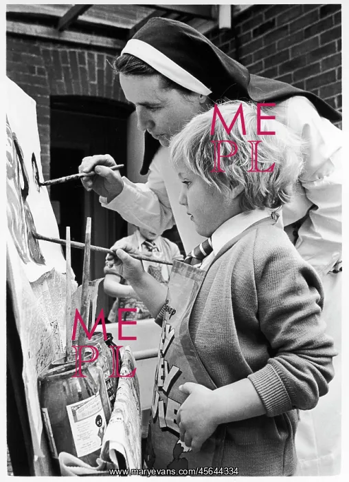 : Nun and child painting : Nun and child painting