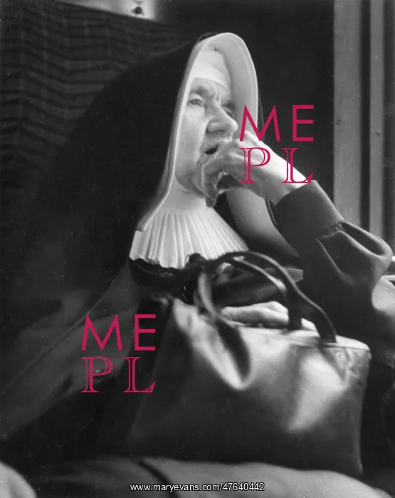 : Nun sitting looking thoughtful : Nun sitting looking thoughtful