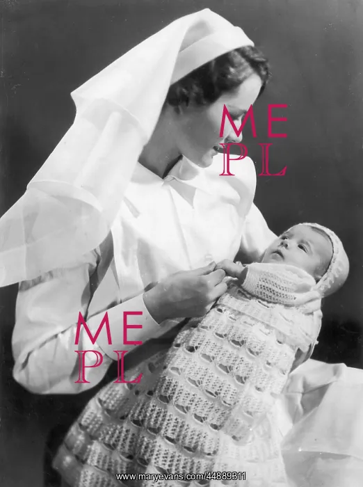 : Nurse holding baby : Nurse holding baby