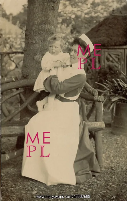  : Nurse holding an infant