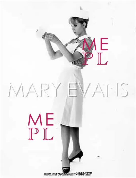  : NURSE. A nurse measures out a dosage of the right medicine