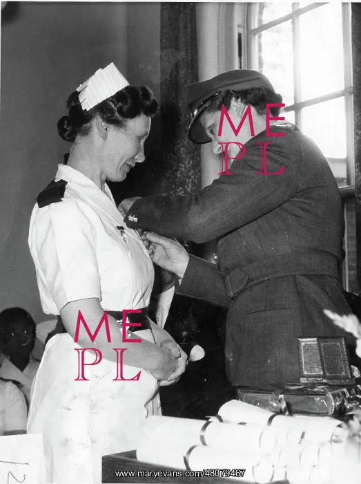 : Nurse receiving an award : Nurse receiving an award