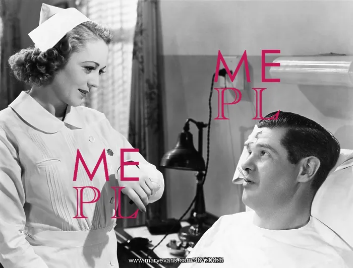 : Nurse taking patients temperature : Nurse taking patients temperature