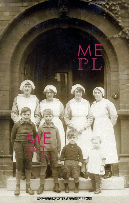 : Nurses and their charges at a Charity Orphanage : Nurses and their charges at a Charity Orphanage