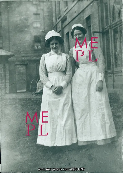 : Two nurses outside institution : Two nurses outside institution