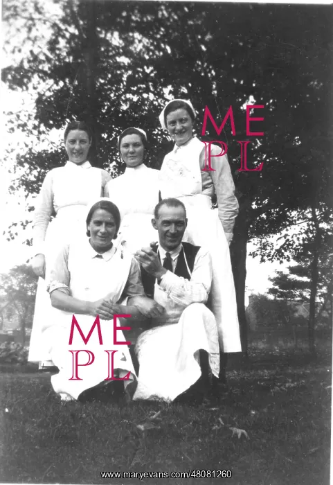 : Four nurses, probable doctor : Four nurses, probable doctor
