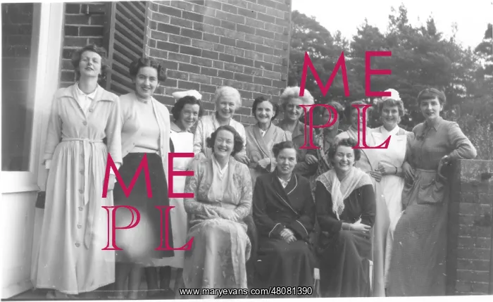 : Nurses and women in dressing gowns : Nurses and women in dressing gowns