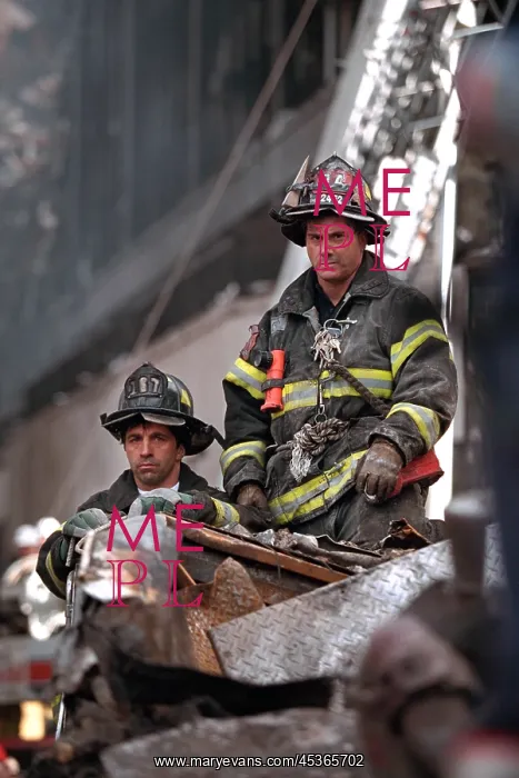 : NYC Firemen, grim and geared for rescue / recovery : NYC Firemen, grim and geared for rescue / recovery