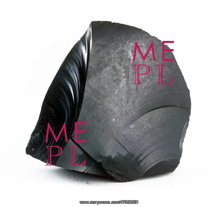 : Obsidian. A glassy black material, formed when volcanic lava cools rapidly : Obsidian. A glassy black material, formed when volcanic lava cools rapidly